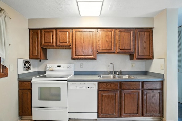 4143 Jonquil St, Columbus, OH 43224 - kitchen featuring white appliances and a sink