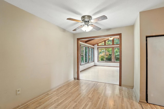 4143 Jonquil St, Columbus, OH 43224 - spare room with a ceiling fan, light wood-style flooring, and vaulted ceiling