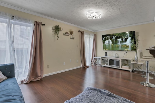 5276 Marci Way, Columbus, OH 43228 - living area featuring a textured ceiling, wood finished floors, and crown molding