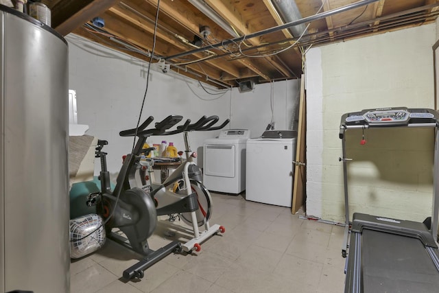 5276 Marci Way, Columbus, OH 43228 - exercise area featuring separate washer and dryer and concrete block wall