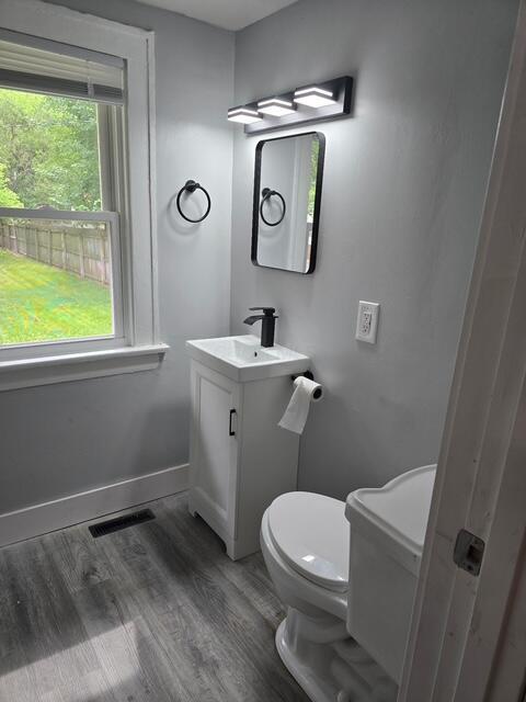 82 Whitethorne Ave, Columbus, OH 43223 - bathroom with vanity and wood finished floors