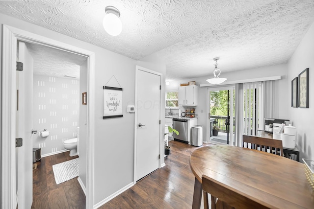 8194 Baltimore Ave Unit 6E, Westerville, OH 43081 - dining space with dark wood-type flooring and a textured ceiling