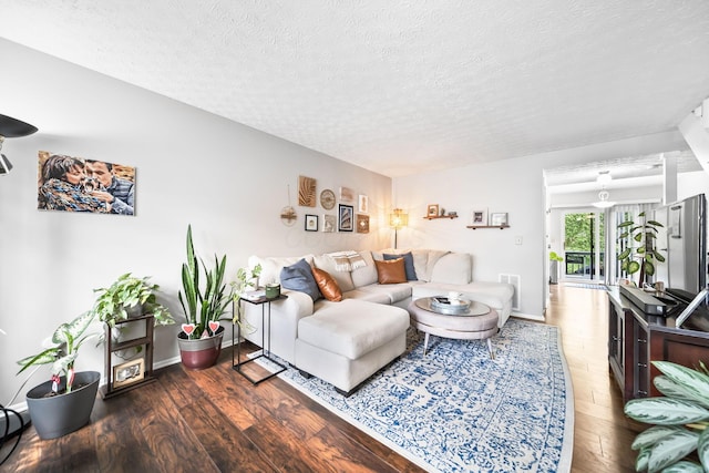 8194 Baltimore Ave Unit 6E, Westerville, OH 43081 - living room featuring wood finished floors and a textured ceiling