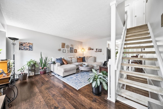 8194 Baltimore Ave Unit 6E, Westerville, OH 43081 - living area featuring stairs, a textured ceiling, and wood finished floors