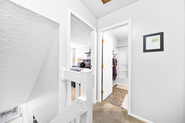8194 Baltimore Ave Unit 6E, Westerville, OH 43081 - hall featuring a textured ceiling and carpet floors