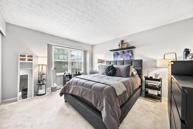 8194 Baltimore Ave Unit 6E, Westerville, OH 43081 - bedroom featuring light colored carpet and a textured ceiling
