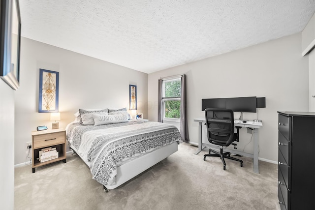 8194 Baltimore Ave Unit 6E, Westerville, OH 43081 - bedroom with light colored carpet, a textured ceiling, and an office area