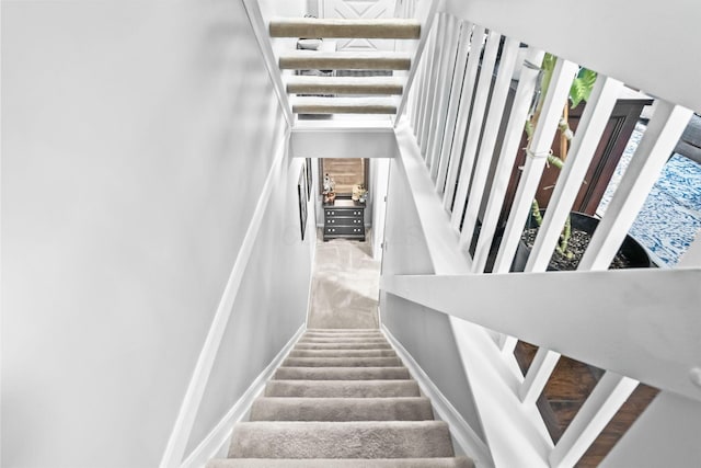 8194 Baltimore Ave Unit 6E, Westerville, OH 43081 - stairs with carpet flooring and plenty of natural light