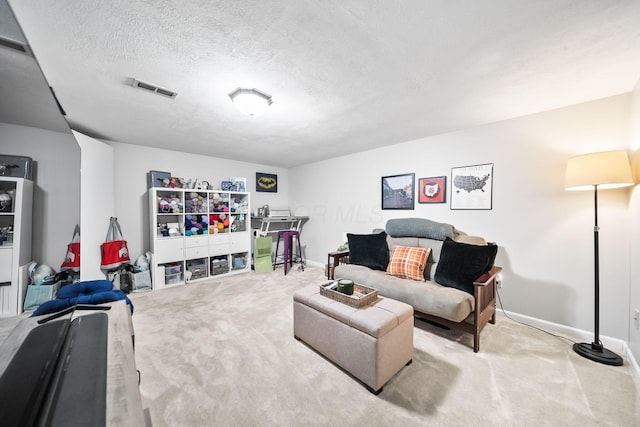 8194 Baltimore Ave Unit 6E, Westerville, OH 43081 - carpeted living area with baseboards and a textured ceiling