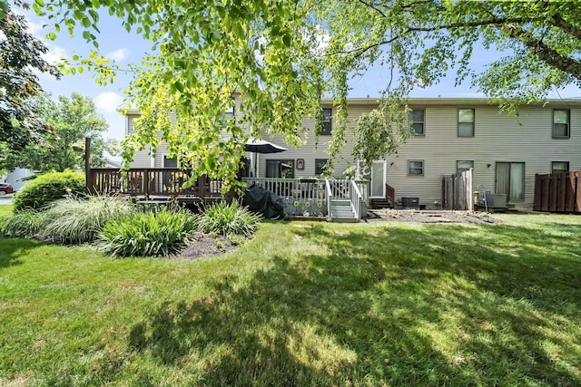 8194 Baltimore Ave Unit 6E, Westerville, OH 43081 - rear view of property with a yard and a deck