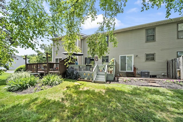 8194 Baltimore Ave Unit 6E, Westerville, OH 43081 - rear view of property with a lawn and a deck
