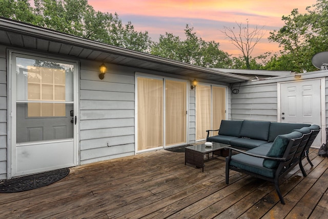 711 Cherry Hollow Rd Unit A, Columbus, OH 43228 - deck at dusk featuring outdoor lounge area