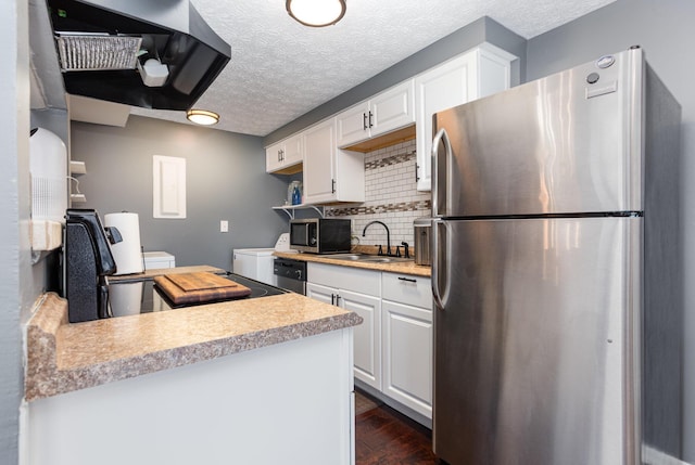 711 Cherry Hollow Rd Unit A, Columbus, OH 43228 - kitchen featuring appliances with stainless steel finishes, tasteful backsplash, white cabinetry, light countertops, and dark wood-type flooring