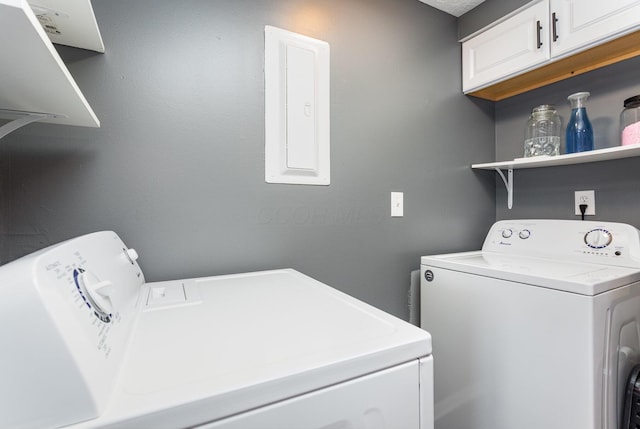 711 Cherry Hollow Rd Unit A, Columbus, OH 43228 - laundry room featuring washing machine and dryer, cabinet space, and electric panel