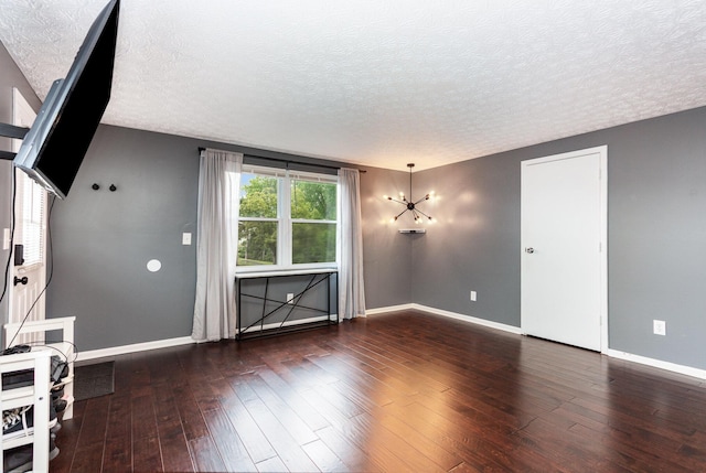 711 Cherry Hollow Rd Unit A, Columbus, OH 43228 - unfurnished living room with a textured ceiling and wood-type flooring