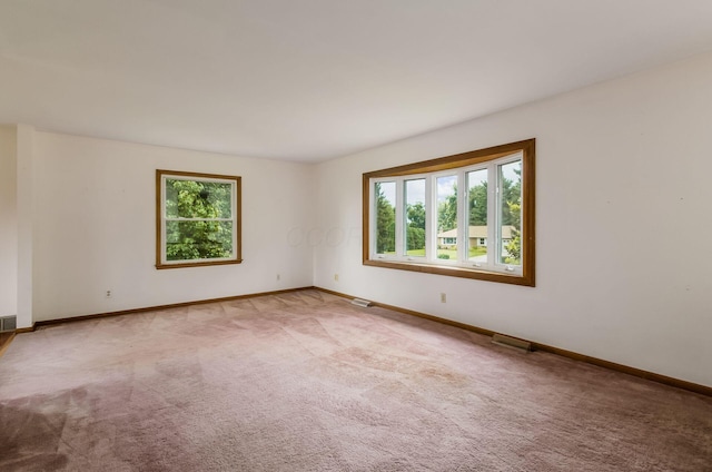 5930 Coonpath Rd NW, Carroll, OH 43112 - carpeted spare room featuring healthy amount of natural light