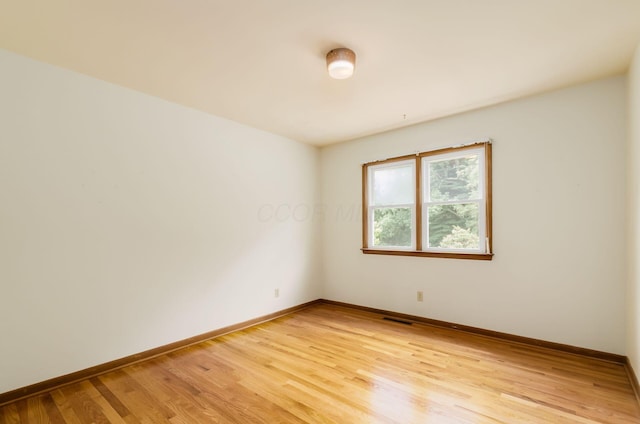 5930 Coonpath Rd NW, Carroll, OH 43112 - spare room with light wood finished floors and baseboards