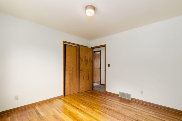 5930 Coonpath Rd NW, Carroll, OH 43112 - empty room featuring light wood-style floors and baseboards
