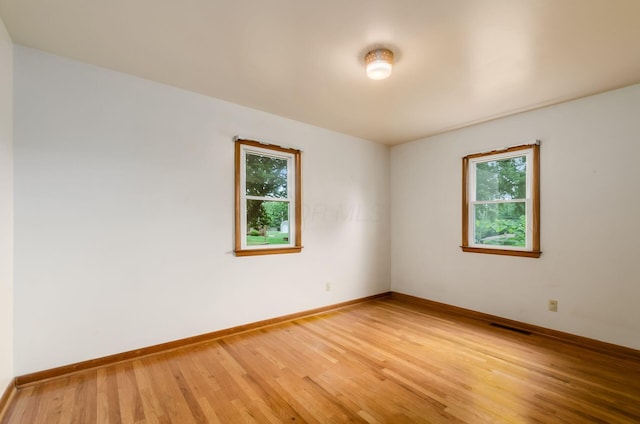 5930 Coonpath Rd NW, Carroll, OH 43112 - spare room featuring light wood-type flooring and baseboards