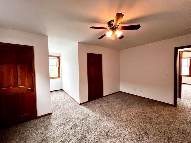 268 Clayburne Blvd, Chillicothe, OH 45601 - unfurnished bedroom with carpet floors, ceiling fan, and a closet