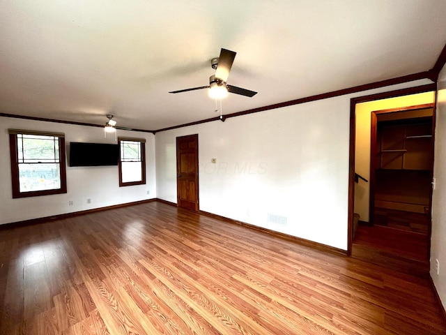 268 Clayburne Blvd, Chillicothe, OH 45601 - spare room featuring ornamental molding, wood finished floors, and a ceiling fan