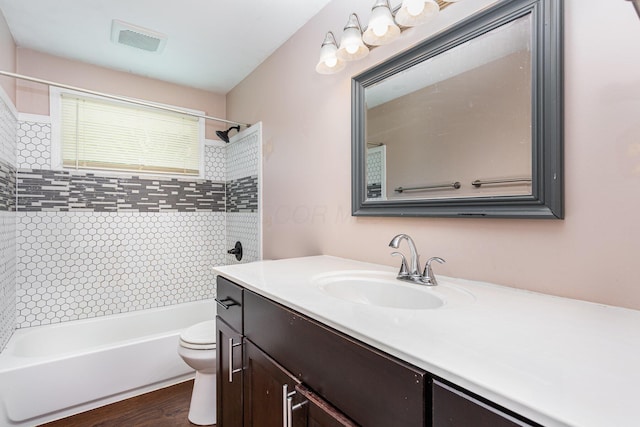 2115 Case Rd, Columbus, OH 43224 - bathroom with vanity,  shower combination, and wood finished floors