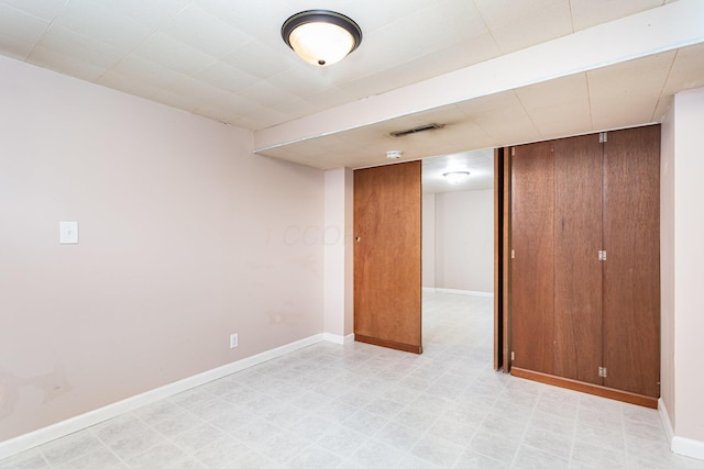 2115 Case Rd, Columbus, OH 43224 - finished basement with baseboards and light floors