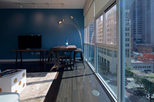 100 E Gay St Unit 804, Columbus, OH 43215 - dining area with wood finished floors, track lighting, and a city view