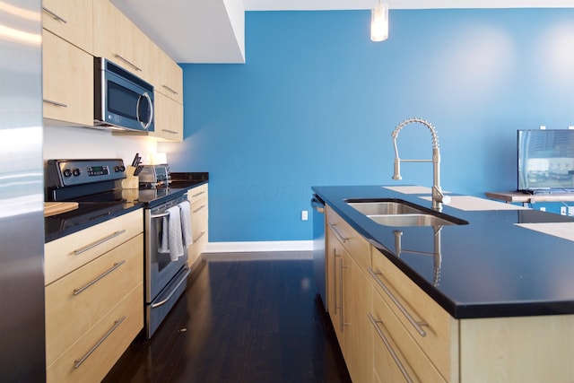 100 E Gay St Unit 804, Columbus, OH 43215 - kitchen featuring light brown cabinets, stainless steel appliances, an island with sink, dark wood-style floors, and modern cabinets