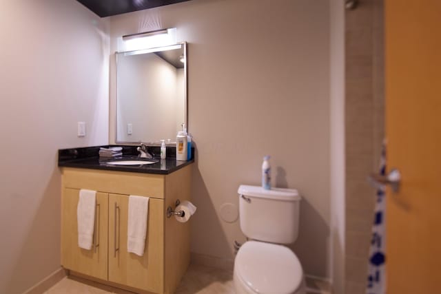 100 E Gay St Unit 804, Columbus, OH 43215 - half bathroom featuring vanity and toilet