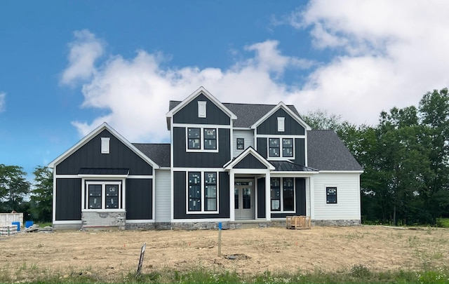 2020 Liberty Trl, Powell, OH 43065 - view of front facade featuring a standing seam roof and a metal roof