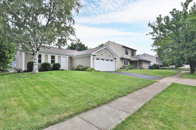 3808 Peak Ridge Dr, Columbus, OH 43230 - view of front of home with an attached garage and driveway