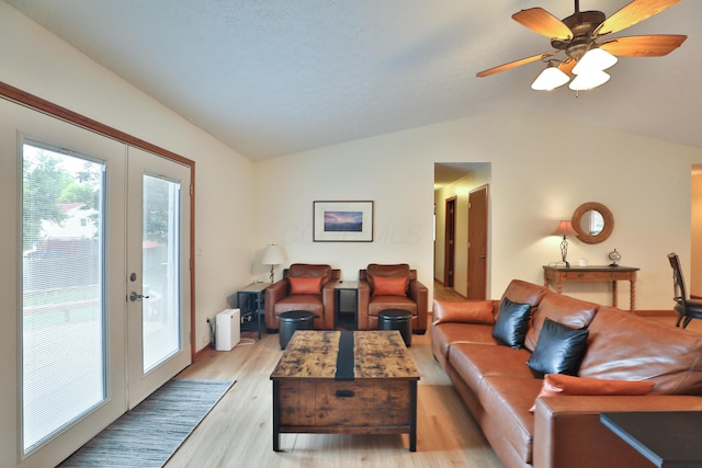 3808 Peak Ridge Dr, Columbus, OH 43230 - living room with french doors, vaulted ceiling, light wood-style flooring, and a ceiling fan