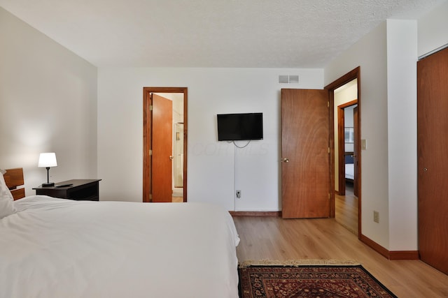 3808 Peak Ridge Dr, Columbus, OH 43230 - bedroom featuring light wood finished floors and baseboards