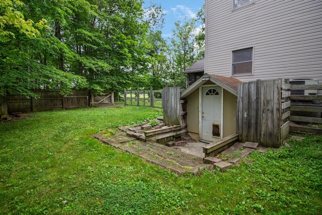 7740 Gale Rd SW, Hebron, OH 43025 - fenced backyard featuring a storage unit