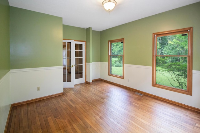 7740 Gale Rd SW, Hebron, OH 43025 - empty room featuring french doors and wood-type flooring