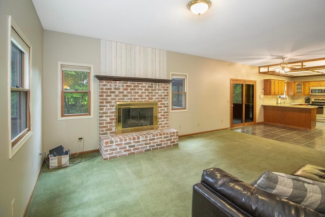 7740 Gale Rd SW, Hebron, OH 43025 - living room with carpet flooring and a fireplace