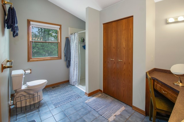 7740 Gale Rd SW, Hebron, OH 43025 - full bathroom featuring a shower with curtain, lofted ceiling, tile patterned floors, and vanity