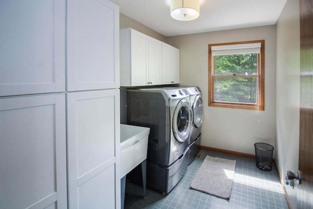 7740 Gale Rd SW, Hebron, OH 43025 - washroom featuring cabinet space and washing machine and clothes dryer