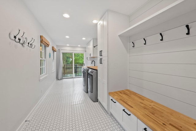2560 Zollinger Rd, Columbus, OH 43221 - mudroom featuring baseboards and recessed lighting