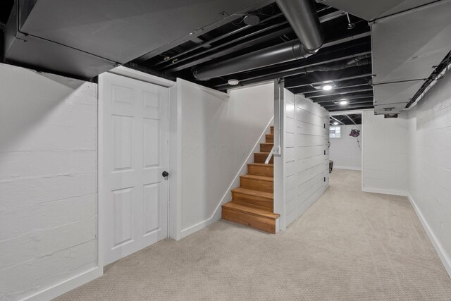 2560 Zollinger Rd, Columbus, OH 43221 - basement with carpet flooring and stairs