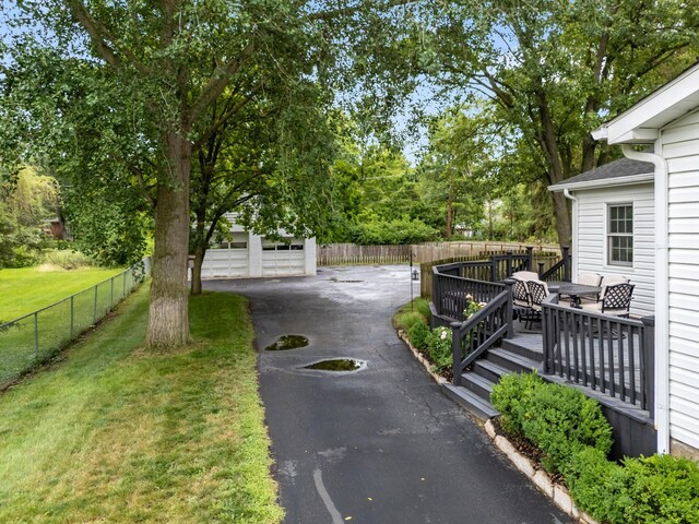 2560 Zollinger Rd, Columbus, OH 43221 - view of asphalt driveway