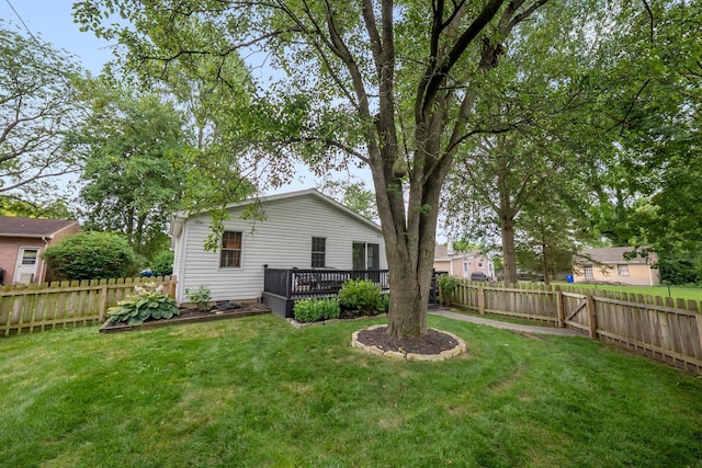 2560 Zollinger Rd, Columbus, OH 43221 - rear view of property with a fenced backyard and a deck