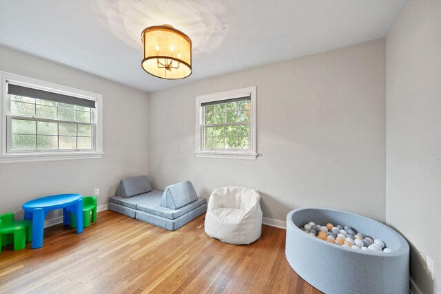 2560 Zollinger Rd, Columbus, OH 43221 - bedroom featuring wood finished floors and baseboards