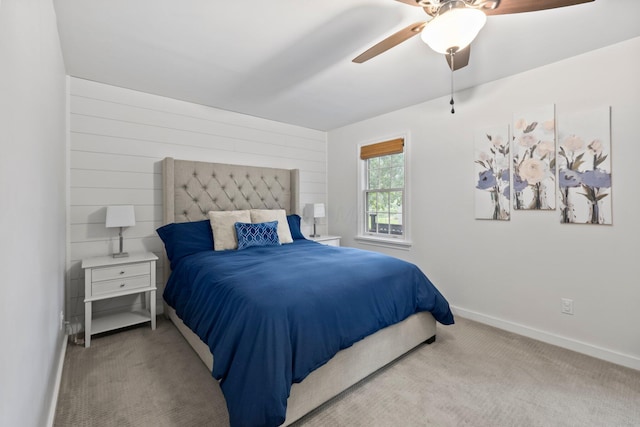 2560 Zollinger Rd, Columbus, OH 43221 - carpeted bedroom with baseboards and a ceiling fan