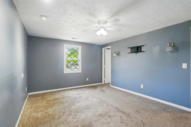 2605 Bella Via Ave, Columbus, OH 43231 - carpeted empty room with a ceiling fan and a textured ceiling