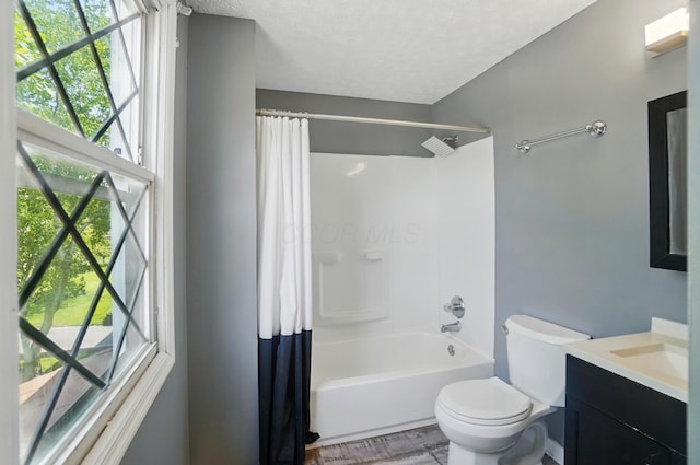 2605 Bella Via Ave, Columbus, OH 43231 - full bath featuring vanity, shower / bath combo with shower curtain, and a textured ceiling
