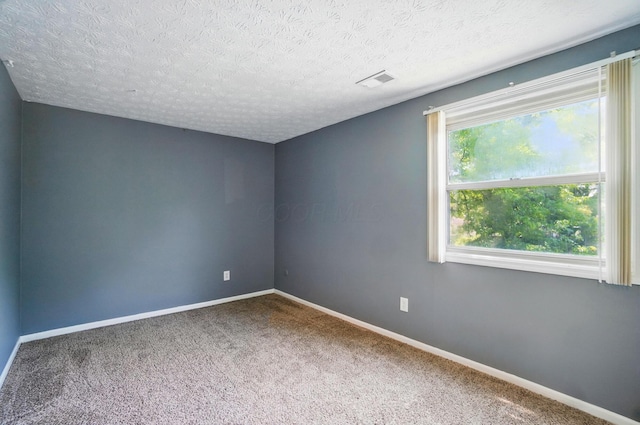 2605 Bella Via Ave, Columbus, OH 43231 - carpeted spare room with a textured ceiling and baseboards