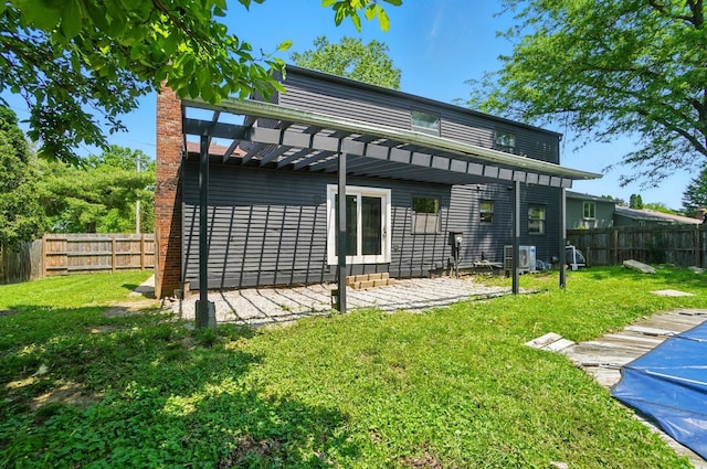 2605 Bella Via Ave, Columbus, OH 43231 - back of property featuring a pergola, a fenced backyard, a chimney, and a patio area