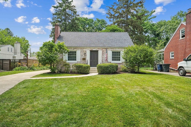 527 N Columbia Ave, Bexley, OH 43209 - view of front of home featuring a shingled roof and a chimney
